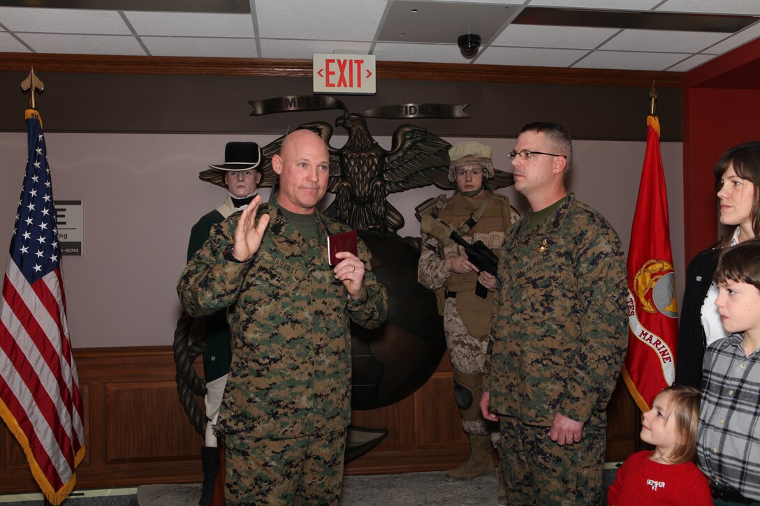 Master Gunnery Sergeant Chad Ramsey is reinlisted for another four years by the 17th Sergeant Major of the Marine Corps, Sergeant Major Micheal P. Barrett at the Commandant's Hallway, The Pentagon, on December 4, 2012. (Official U.S. Marine Corps photo by Sergeant Christopher A. Green) Not Released