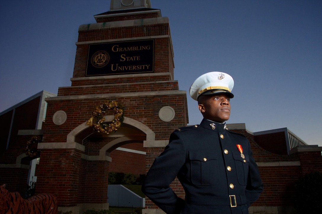 Second Lieutenant Olaolu Ogunyemi wears the iconic “Dress Blue’s” for the first time as he prepares to begin his career as the Marine Corps’ most recently commissioned officer.  Ogunyemi, who is the first Marine officer commissioned from Grambling State University in more than three decades, graduated with a Bachelor of Science degree in Computer Information Systems Dec. 14, 2012. He joins a distinguished heritage of African-American officers started by Frederick C. Branch, the Corps’ first Black officer.     