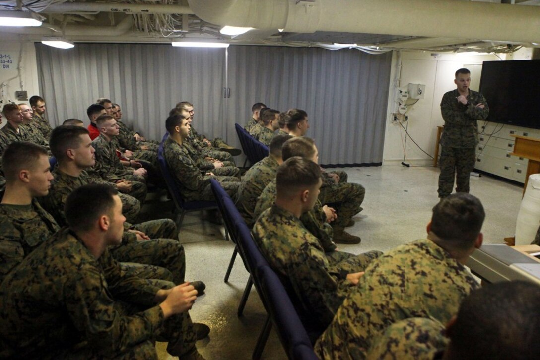 First Sgt. Gregory Mitchell, the battery 1st sergeant for India Battery, Battalion Landing Team 1st Battalion, 2nd Marine Regiment, 24th Marine Expeditionary Unit, speaks to his Marines during reintegration training aboard the USS New York, Dec. 11, 2012. The 24th MEU is returning home in time for the holidays after spending most of 2012 deployed in the U.S. Navy's 5th and 6th Fleet areas of responsibility as an expeditionary crisis response force, maintaining presence aboard the ships of the Iwo Jima Amphibious Ready Group within the U.S. Central, European and Africa Commands. (U.S. Marine Corps photo by Cpl. Michael Petersheim)


