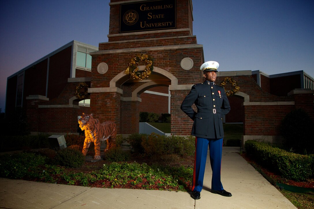 Second Lieutenant Olaolu Ogunyemi wears the iconic “Dress Blue’s” for the first time as he prepares to begin his career as the Marine Corps’ most recently commissioned officer.  Ogunyemi, who is the first Marine officer commissioned from Grambling State University in more than three decades, graduated with a Bachelor of Science degree in Computer Information Systems Dec. 14, 2012. He joins a distinguished heritage of African-American officers started by Frederick C. Branch, the Corps’ first Black officer.     