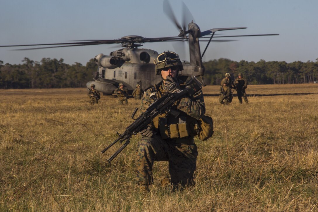 Marines and sailors of Combat Logistics Battalion (CLB) 26, 26th Marine Expeditionary Unit (MEU) participate in a mass casualty scenario during the MEU's Group Sail exercise, Camp Lejeune, N.C., Dec. 14, 2012. Group Sail consists of multiple training scenarios to include different variations of raids; visit, board, search and seizure (VBSS) training; and tactical recovery of aircraft and personnel (TRAP) simulations. The 26th MEU operates continuously across the globe, providing the president and unified combatant commanders with a forward-deployed, sea-based quick reaction force. The MEU is a Marine Air-Ground Task Force capable of conducting amphibious operations, crisis response, and limited contingency operations. The 26th MEU is slated to deploy in 2013. (Official U.S. Marine Corps photograph by Cpl. Michael Lockett)