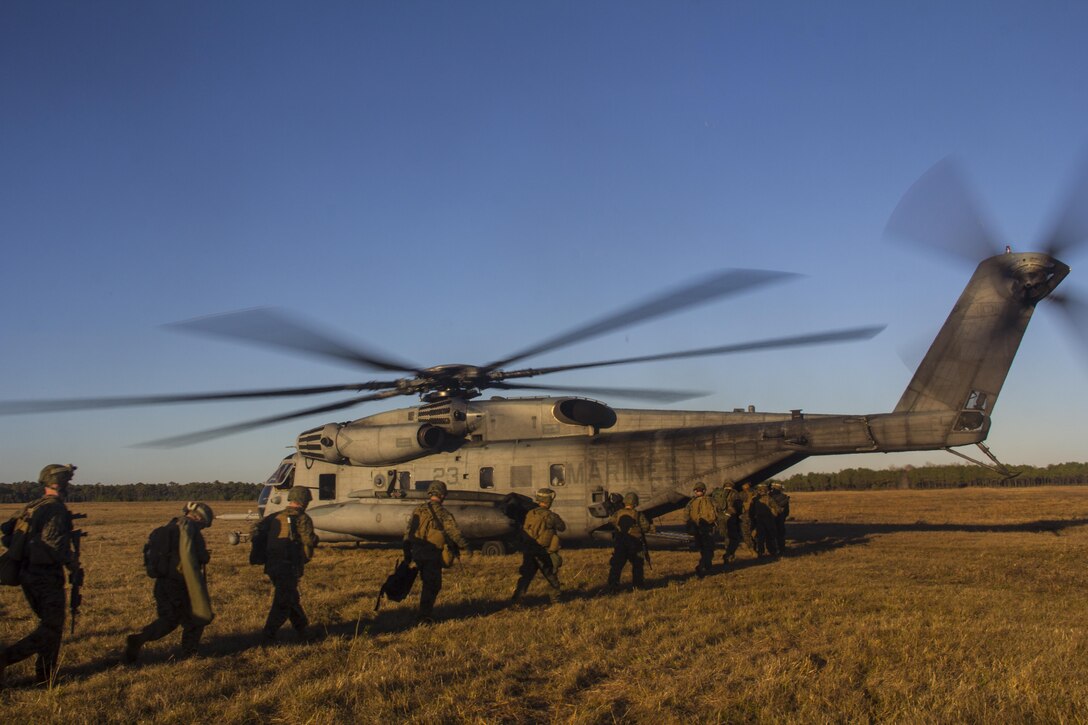Marines and sailors of Combat Logistics Battalion (CLB) 26, 26th Marine Expeditionary Unit (MEU), participate in a mass casualty scenario during the MEU's Group Sail exercise, Camp Lejeune, N.C., Dec. 14, 2012. Group Sail consists of multiple training scenarios to include different variations of raids; visit, board, search and seizure (VBSS) training; and tactical recovery of aircraft and personnel (TRAP) simulations. The 26th MEU operates continuously across the globe, providing the president and unified combatant commanders with a forward-deployed, sea-based quick reaction force. The MEU is a Marine Air-Ground Task Force capable of conducting amphibious operations, crisis response, and limited contingency operations. The 26th MEU is slated to deploy in 2013. (Official U.S. Marine Corps photograph by Cpl. Michael Lockett)