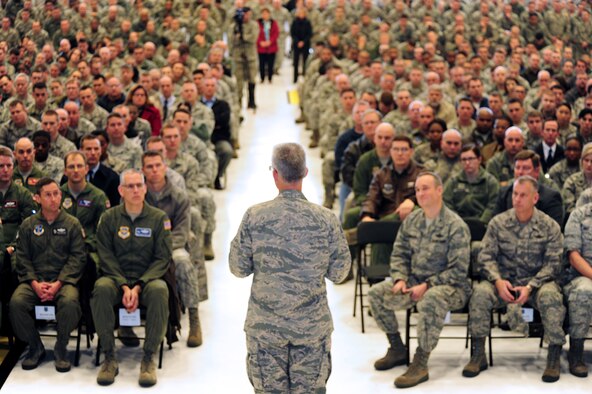 Members of Team Fairchild lock eyes on Gen. Paul Selva, the Air Mobility Command commander, as he talks about his three priorities for mobility Airmen, which are executing the mission, cultivating a caring and respectful workplace and training Airmen at Fairchild Air Force Base, Wash., Dec. 12, 2012. The all call provided face-to-face communication between Selva and mobility Airmen. (U.S. Air Force photo by Janelle Patino) 