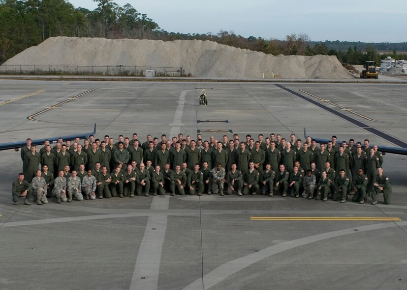 A group photo of the 319th Special Operations Squadron, 1st Special Operations Wing, Hurlburt Field, Fla. taken Dec. 5, 2012. The 319th SOS recently returned from the first-ever unit deployment for the 1st Special Operations Wing. (DoD photo by A1C Hayden Hyatt) RELEASED