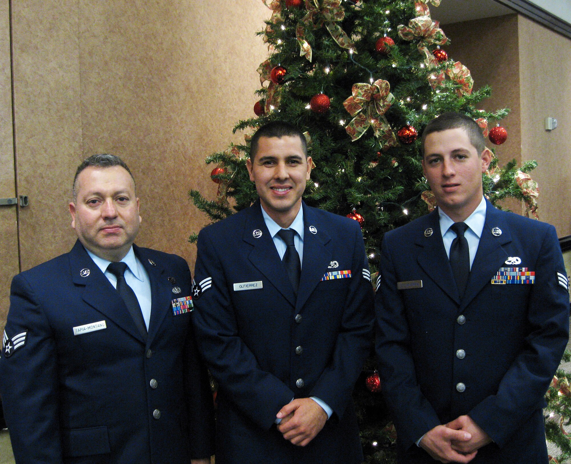 TRAVIS AIR FORCE BASE, Calif. --  From the left are: Senior Amn. Victor Tapia-Montaro, 349th Force Support Squadron, SrA. Larry Gutierrez, 349th Maintenance Squadron, and SrA. Cody Etcheverria, 349th MXS. Unable to attend the graduation was SrA. Michael Case, 349th Civil Engineer Squadron,  graduated from Travis AFB Airman Leadership School Dec. 13.. (U.S. Air Force photo/Master Sgt. Benjamin Scott)              