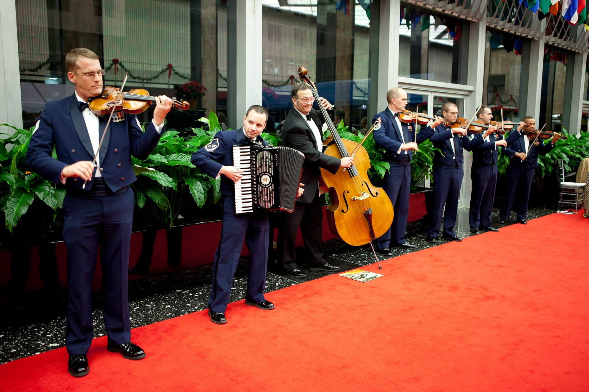 Led by Strolling Strings director, Tech. Sgt. Luke Wedge, the Air Force Strolling Strings entertained this year’s Kennedy Center honorees. (Photo provided by Scott Suchman)