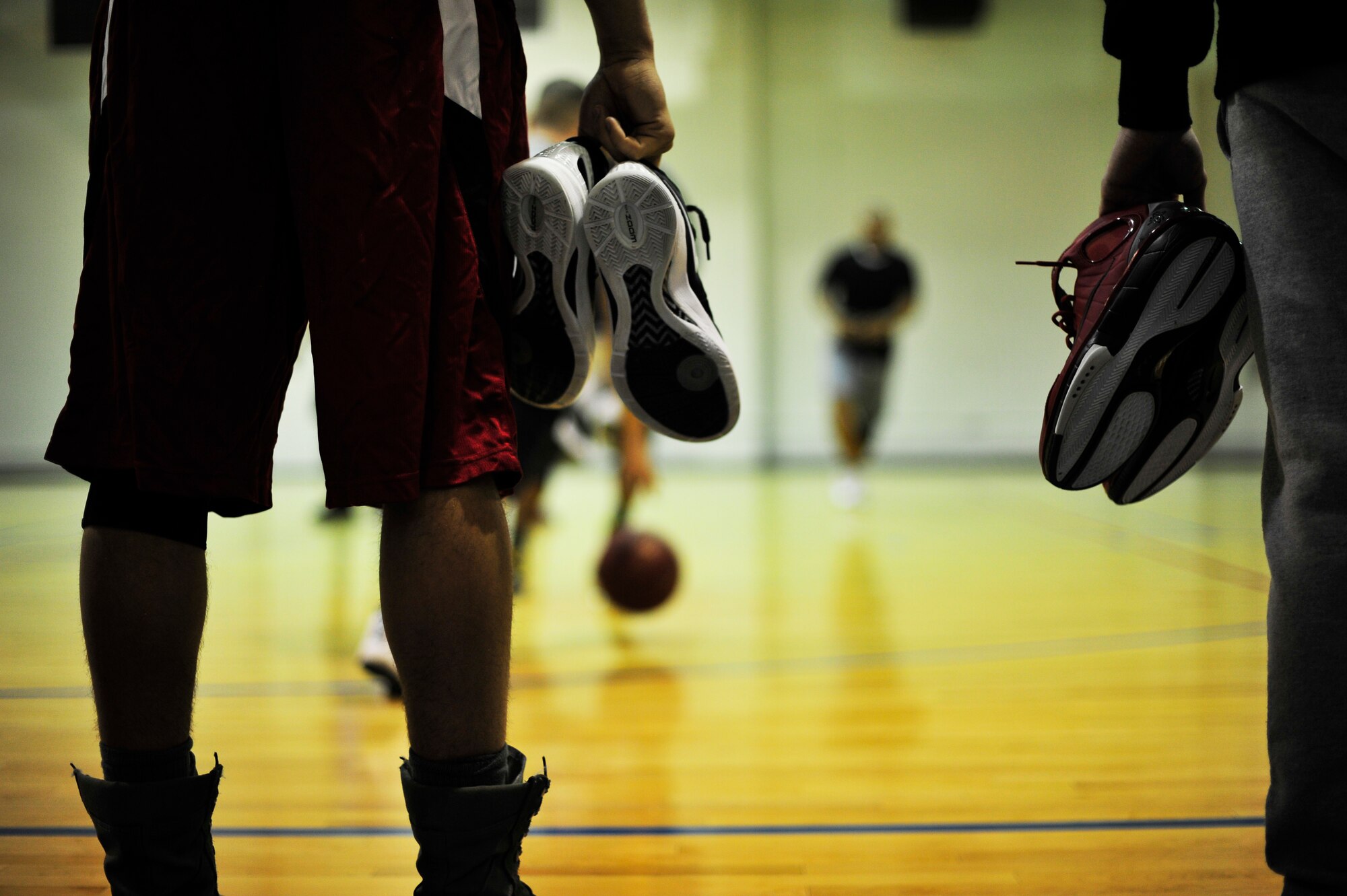 Team Andrews Service members watch the 3-on-3 basketball tournament at the East Fitness Center, Dec. 7, 2012. The tournament was held as a part of “Operation Holiday Cheer,” which aimed to promote unity and teamwork between Joint Base Andrews military members. (U.S. Air Force photo/ Airman 1st Class Erin O’Shea)