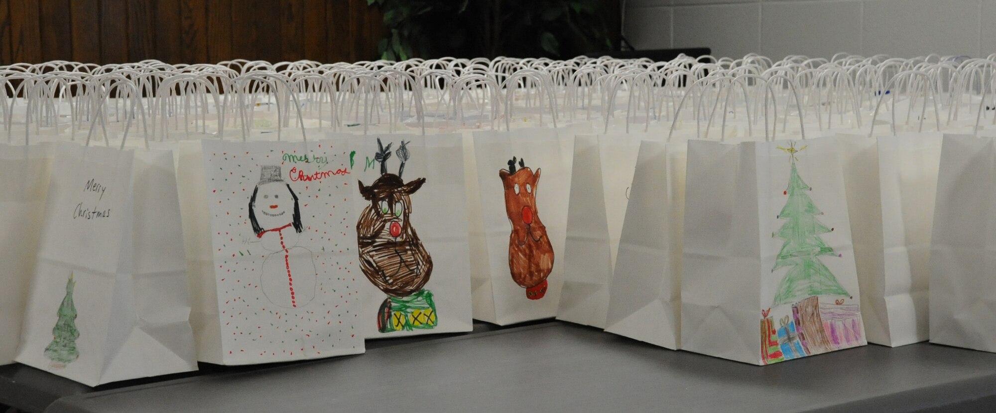 Over 2000 dozen cookies were collected and packaged for delivery as part of the base-wide "Colossal Cookie Drive," on Dec. 14. Bags were decorated by local schools including Sheppard Elementary, Fain Elementary, Haynes Elementary, Kate Burgess Elementary, John Tower and Burburnett Middle School. (U.S. Air Force Photo/Kimberly Parker)