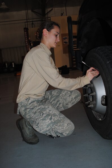 Senior Airman Stephanie Woods, 341st Logistics Readiness Squadron mobile maintenance technician, checks the tire pressure on a Ford F-350 Super Duty Truck, before responding to a vehicle breakdown. The mobile maintenance section must perform daily checks on their vehicles by using the Air Force Form 1800. (U.S. Air Force photo/Airman 1st Class Katrina Heikkinen)
