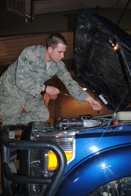 Senior Airman James Skare, 341st Logistics Readiness Squadron mobile maintenance technician, checks the oil in a Ford F-350 Super Duty truck. Skare and the rest of his team must perform routine checks on their vehicles before they can respond to broken or malfunctioned vehicles within the missile complex. (U.S. Air Force photo/Airman 1st Class Katrina Heikkinen)