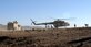 Afghan Air Force Kandahar Air Wing Mi-17 helicopter crew members and Afghan Border Police deliver humanitarian aid to the village of Gagre Naw, Afghanistan, during Operation Southern Strike IV, Nov. 18, 2012. (U.S. Army Photo/Staff Sgt. Ryan Sheldon)