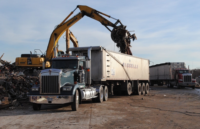 A semi truck is loaded with storm-damage debris Nov. 20, at Jacob Riis Park, a temporary collection site in Queens, N.Y. To date, the Army Corps has moved approximately 270,000 cubic yards of debris out of Riis, and other storage sites in Brooklyn and Staten Island, to permanent landfills.