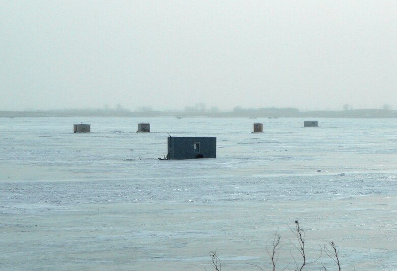 Each winter, as the temperatures drop and the ice thickens, fisherman set up temporary structrues on Lake Sakakawea to support fishing on the ice.