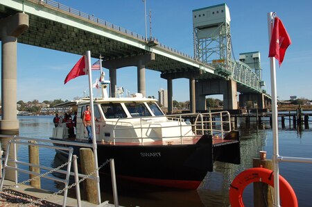After its christening, Wilmington District Navigation members take the Swart family for a short ride on the Cape Fear River. (Photo by Henry Heusinkveld)


