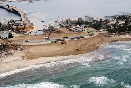 The U.S. Army Corps of Engineers worked rapidly to repair a levee breach caused by Hurricane Sandy in Mantoloking, N.J. The breach occurred at the end of the only bridge onto the barrier island, effectively cuting it off from the rest of the state. At the peak of the response effort, the Corps had nearly 4,000 employees from across the nation engaged in more than 38 FEMA mission assignments, exceeding a total of $134 million. (PHOTO BY MARY MARKOS, ST.LOUIS DISTRICT) (Photo by MARY MARKOS)

