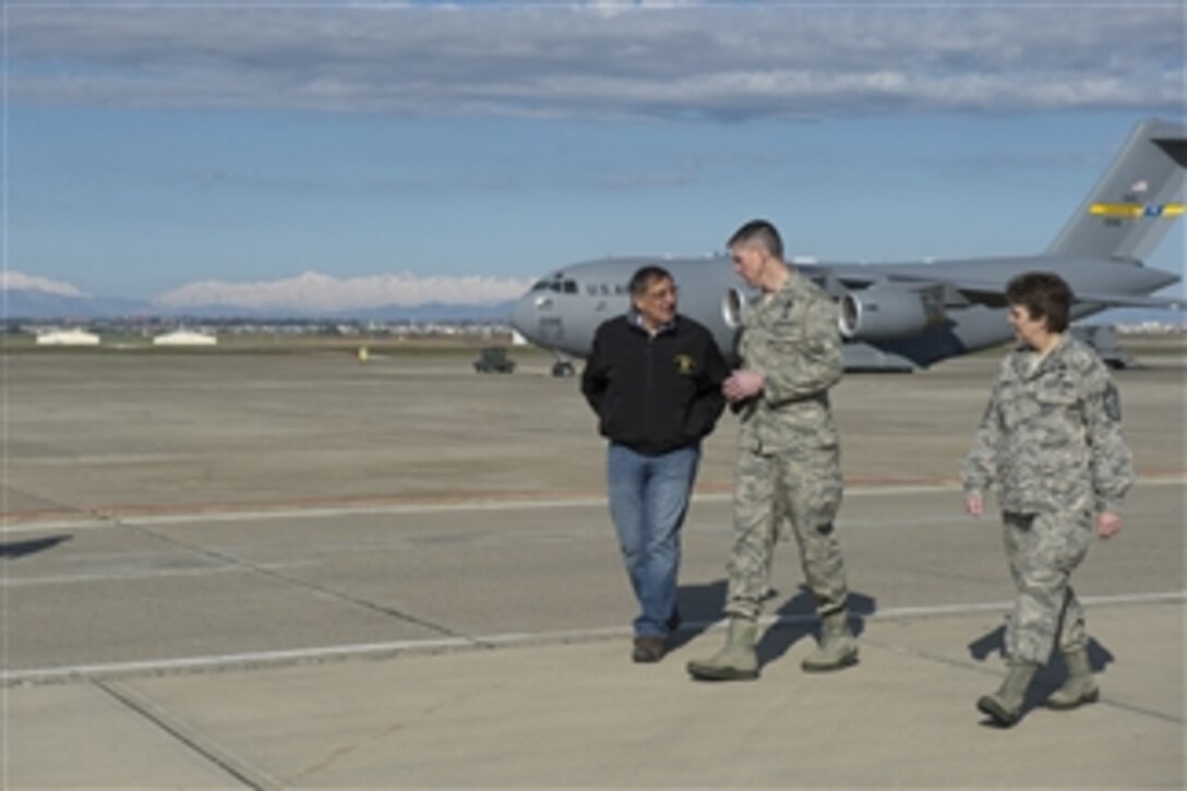 Secretary of Defense Leon E. Panetta, left, walks with U.S. Air Force Col. Christopher Craige, center, commander, 39th Air Base Wing, and Chief Master Sergeant Nancy Judge, 39th Air Base Wing command chief after his arrival at Incirlik Air Base, Turkey, on Dec. 13, 2012.  Panetta is on a five-day trip to the region to meet the deployed troops and with senior leadership.  