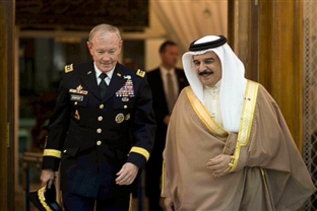 King of Bahrain Hamad bin Isa Al Khalifa, right, meets with U.S. Army Gen Martin E. Dempsey, chairman of the Joint Chiefs of Staff, in Manama, Bahrain, Dec. 13, 2012. 