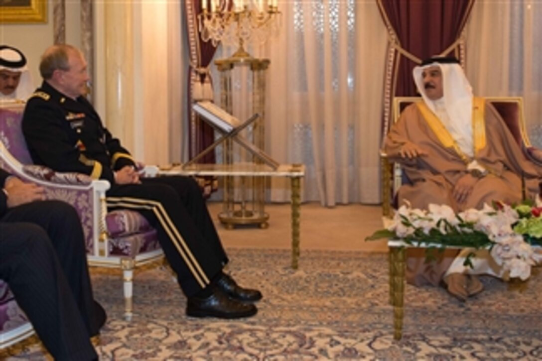 Bahrain’s King Hamad bin Isa Al Khalifa, right, meets with Chairman of the Joint Chiefs of Staff Gen. Martin E. Dempsey in Bahrain on Dec. 13, 2012.  