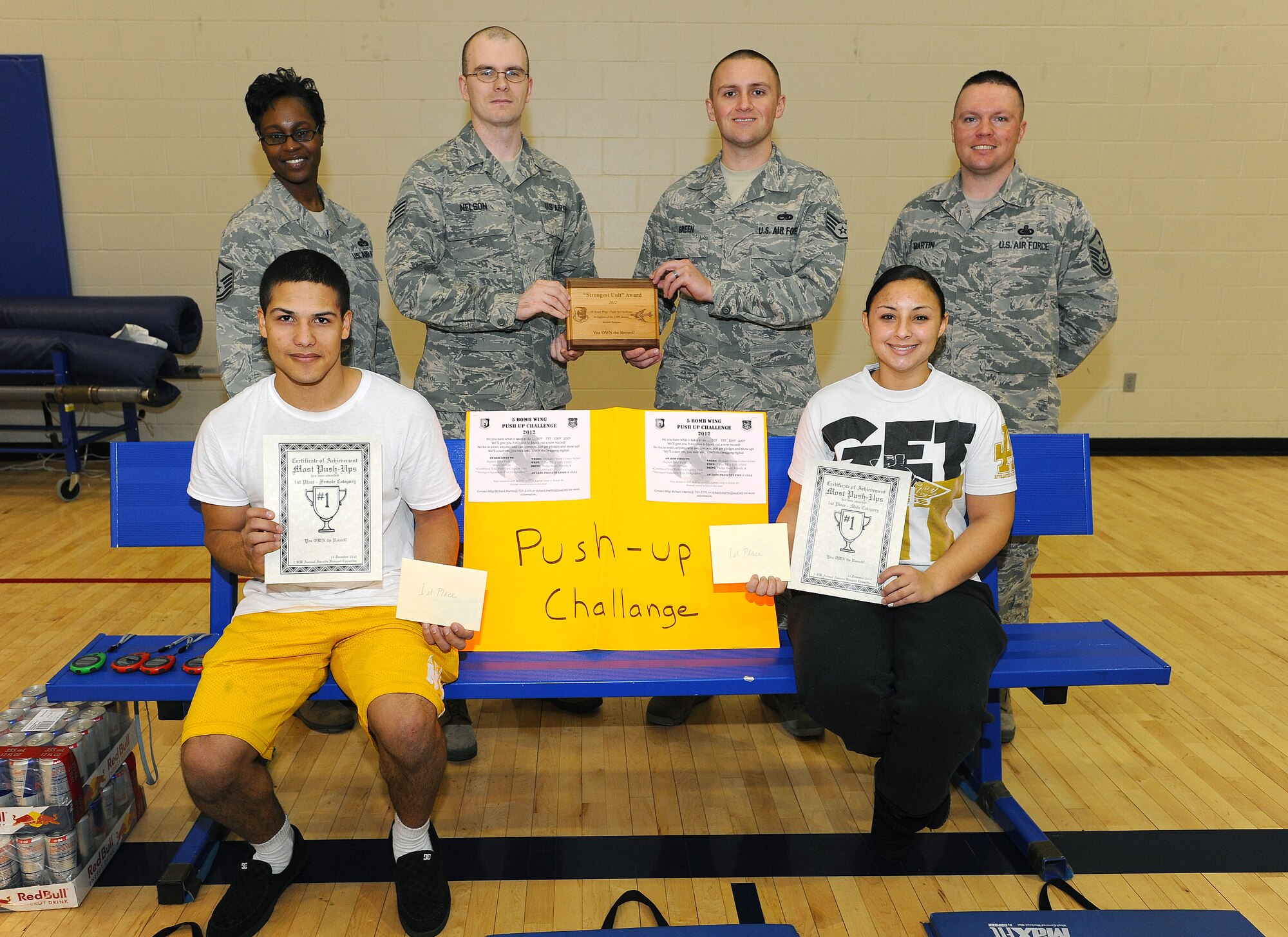 MINOT AIR FORCE BASE, N.D. -- Congratulations to the Airman Leadership School, Airman 1st Class Israel Freeman and Senior Airman Michelle O'neal on dominating the Push-Up competition Dec. 14. Within a three minute time frame, Freeman completed 137 push-ups and O'neal 101. ALS had the highest total push-up count by unit with a combined 2560 push-ups. The unit recieved a memorabilia plaque and two packs of Red-Bull and the first place winners were awarded a $25 gift card. (U.S. Air Force photo/Senior Airman Jose L. Hernandez)