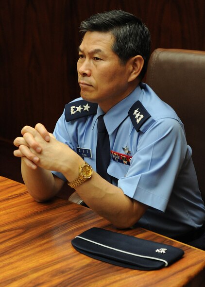 Maj. Gen. Kyeong-Doo Jeong, Defensive Counter Space Planning, Republic of Korea Air Headquarters, listens to a space briefing from Pacific Air Forces personnel during a meeting at PACAF headquarters, Hawaii, Dec. 7, 2012.  Jeong visited PACAF to learn more about how the command operates its space assets. (U.S. Air Force photo/Tech. Sgt. Jerome S. Tayborn)