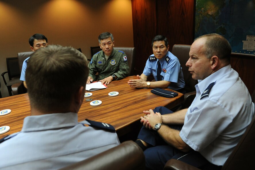 Maj. Gen. Kyeong-Doo Jeong, Defensive Counter Space Planning, Republic of Korea Air Headquarters,  (center) meets with various Pacific Air Forces space officials to foster communication, cooperation, and a stronger working environment between the ROK and U.S. military leaders, at PACAF headquarters, Hawaii, Dec. 7, 2012.  Jeong visited PACAF to address space topics of interest to both nations. (U.S. Air Force photo/Tech. Sgt. Jerome S. Tayborn)