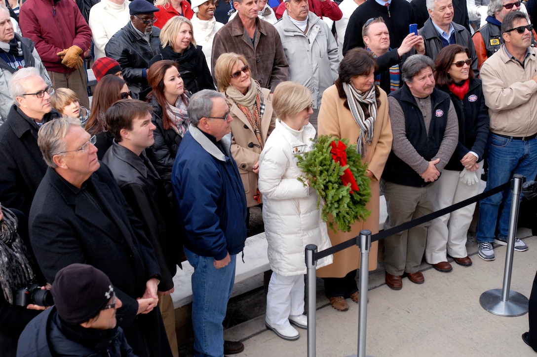 Mary Byers, president of the Gold Star Mothers, holds the, 