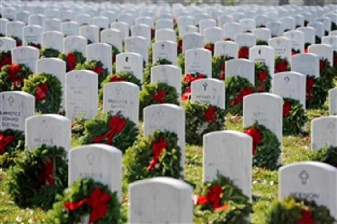 A section of Arlington National Cemetery, Va., shows a fraction of the 110,000 wreaths placed at the graves of fallen service members during Wreaths Across America, Dec. 15, 2012.