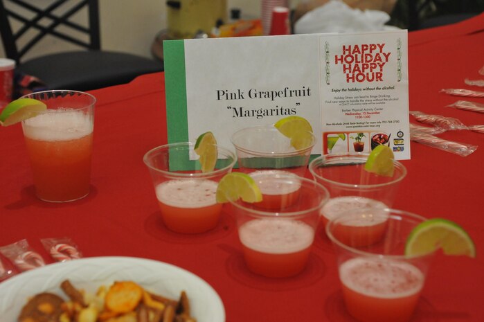 Non-alcoholic drinks such as Pink Grapefruit “Margaritas,” were available during the Semper Fit-Health Promotion Happy Holiday Happy Hour event in the lobby of Barber Physical Activity Center on Dec. 12. Three free non-alcoholic drinks sampled are alternatives to drinking this holiday season. (U.S. Marine Corps photo by Lance Cpl. Antwaun L. Jefferson/Released)
