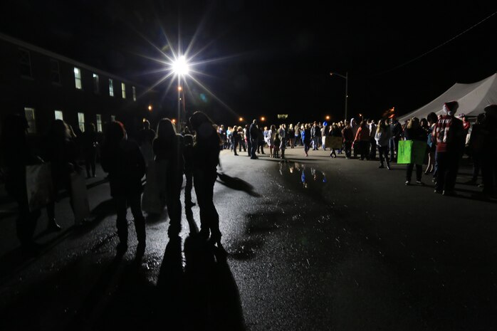 MARINE CORPS BASE CAMP LEJEUNE, N.C. – Friends and family members wait patiently for Marines and Sailors with the 24th Marine Expeditionary Unit to return home from deployment on Camp Lejeune, Dec. 16, 2012. The 24th Marine Expeditionary Unit has returned to the U.S. after completing nearly nine months deployed as an expeditionary crisis response force with the Iwo Jima Amphibious Ready Group.   Approximately 2,300 Marines and Sailors of the 24th MEU will be offloading over the next few days from amphibious assault ships USS Iwo Jima, USS New York and USS Gunston Hall. (Official U.S. Marine Corps Photo by Sgt. Richard Blumenstein)