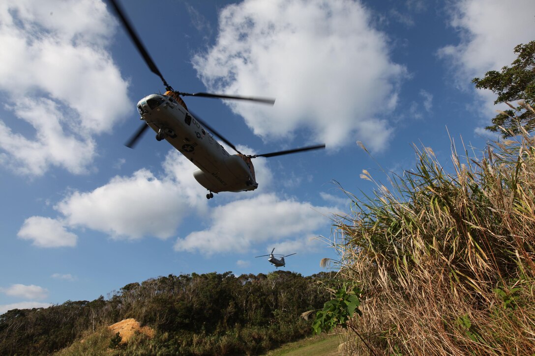 CH-46E Sea Knight helicopters with Marine Medium Helicopter Squadron-262 (Reinforced), 31st Marine Expeditionary Unit, prepare to land and offload Marines of Combat Logistics Battalion-31, 31st MEU, for a mass casualty evacuation exercise here, Dec. 14. Marines and Sailors of CLB-31 secured a landing zone, triaged simulated casualties and evacuated them by priority as part of their preparatory training for the upcoming spring deployment. The 31st MEU is the Marine Corps’ force in readiness for the Asia-Pacific region and the only continuously forward-deployed MEU.