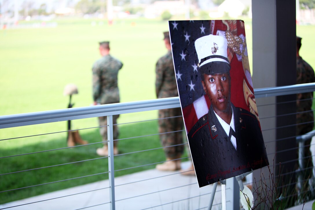 Lance Cpl. Anastasia Jackson’s memorial photo sits on display while Marines who worked with Jackson line up to pay respects to her rifle memorial at Camp Pendleton, Calif., Dec. 12. Jackson, 26, from Philadelphia, died as the result of a diving accident near Mission Beach, Calif., Dec. 1.
