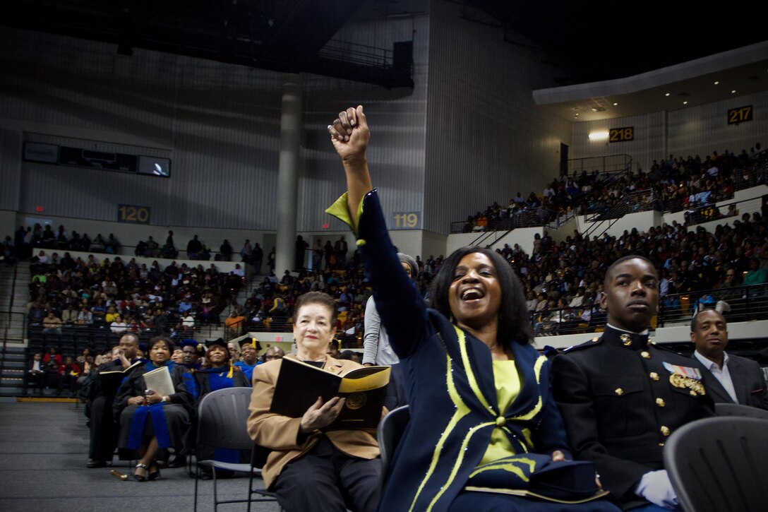 Arnita Ogunyemi expresses her pride for her son Olaolu during his college graduation commencement ceremony at Grambling State University Dec. 14, 2012. The Ogunyemi family has a lot to be proud of; their son is the first Marine Corps officer to commission from Grambling State in more then three decades. 