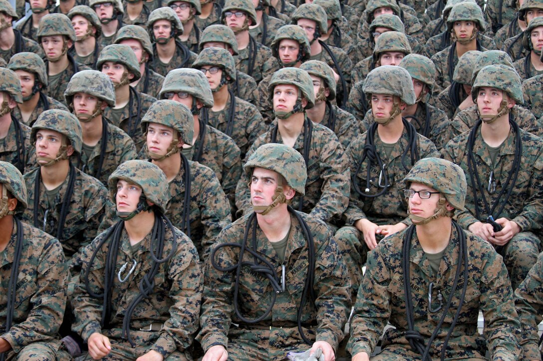 Recruits of Company I, 3rd Recruit Training Battalion, attentively watch as instructors demonstrate a proper descent from the rappel tower aboard Marine Corps Recruit Depot San Digeo Dec. 7.