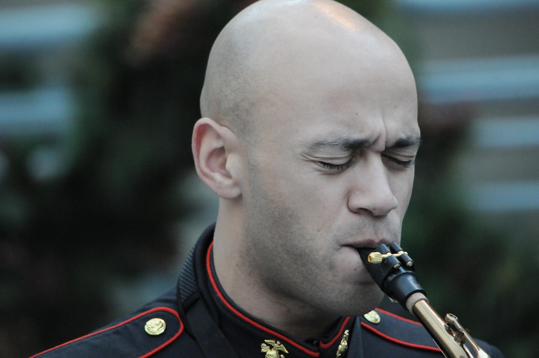 MARINE CORPS BASE QUANTICO, Va. (Dec. 12) – Staff Sgt. Eric Kyne, a saxophonist for the Quantico Marine Band's Party Band, plays for patrons visiting the National Museum of the Marine Corps. The band has scheduled 113 events from Dec. 1 to Dec. 20.
