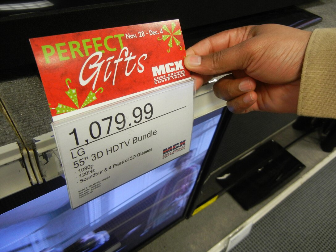 A Marine prices televisions at the Marine Corps Exchange aboard Marine Corps Base Quantico on Nov. 30.