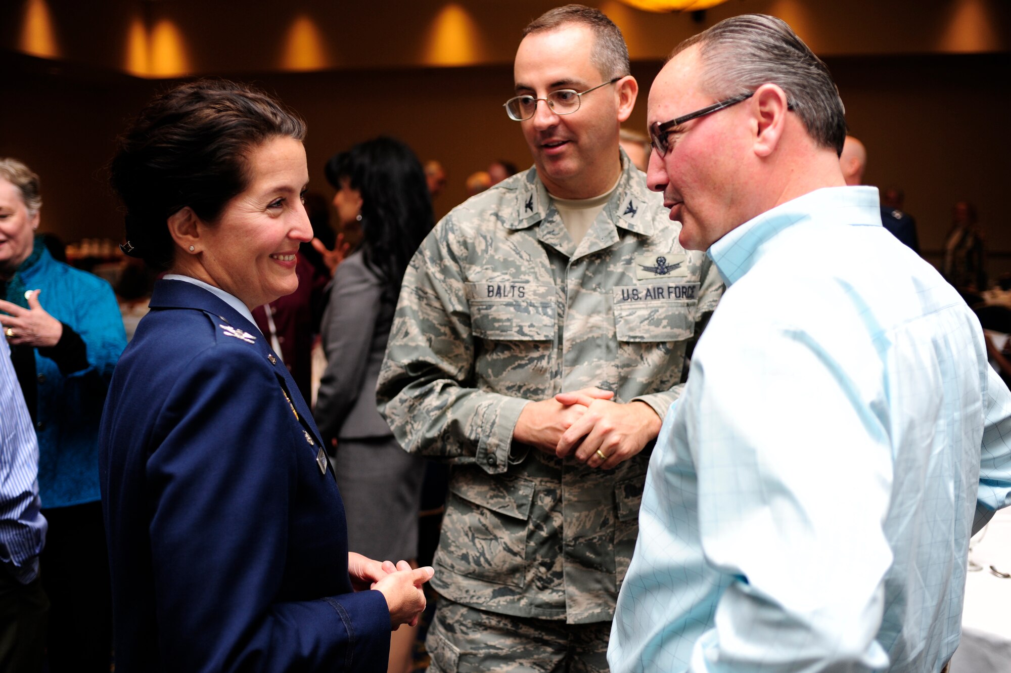VANDENBERG AIR FORCE BASE, Calif. -- Col. Nina Armagno, 30th Space Wing commander, talks to Jim Diani, Commanders Advisory Group member for Air Force Space Command, during the Joint Chambers of Commerce luncheon at the Pacific Coast Club here Wednesday, Jan. 25, 2012. Armagno provided information to the Joint Chambers of Commerce members about Vandenberg's way ahead in 2012. (U.S. Air Force photo/Staff Sgt. Andrew Satran) 
