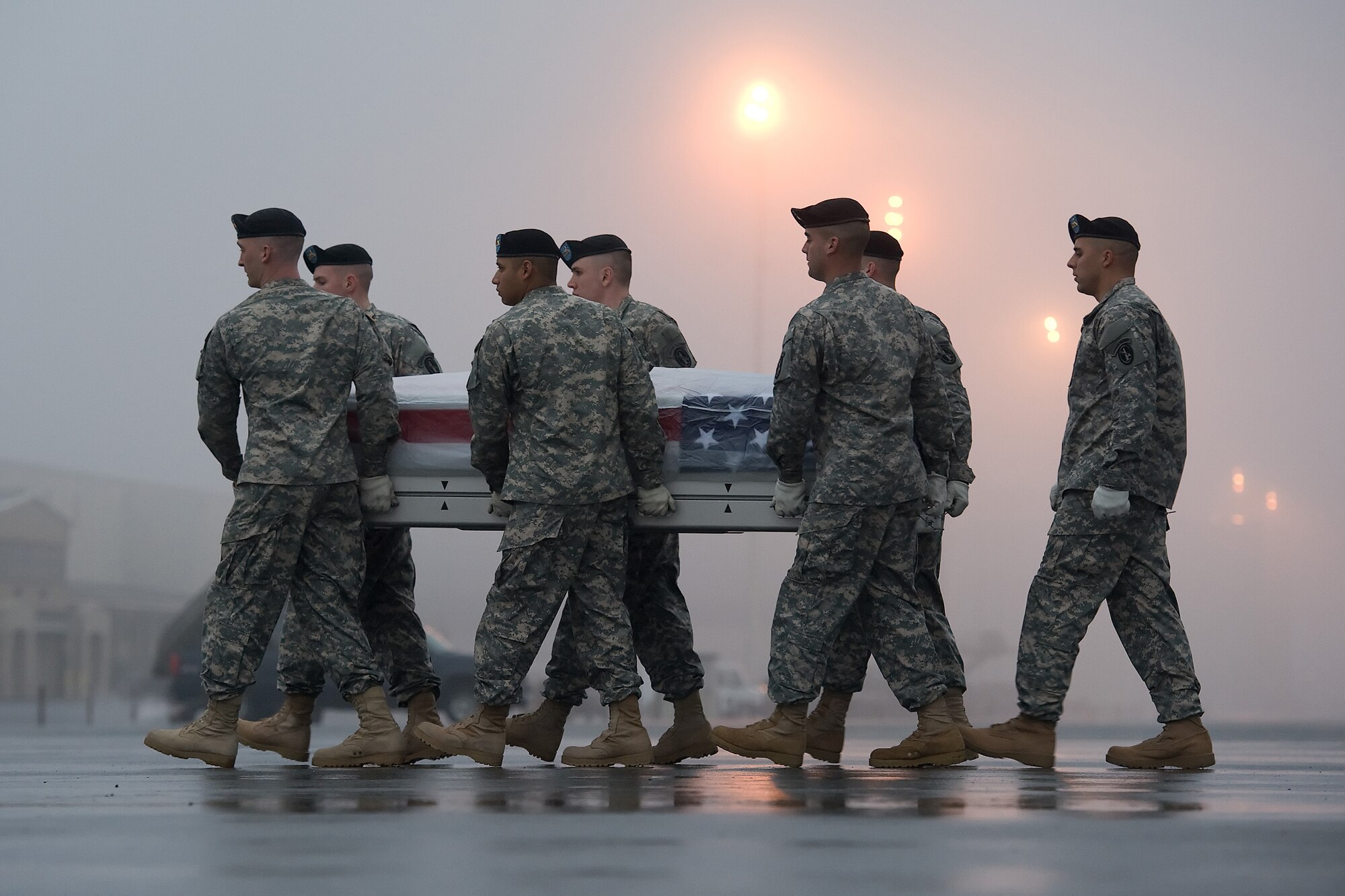 A U.S. Army carry team transfers the remains of Sgt. 1st Class Kevin E. Lipari, 39, of Baldwin, N.Y., at Dover AFB, Del., Dec. 17, 2012. Lipari was assigned to HHC 173rd Airborne Brigade Combat Team, Bamberg, Germany. (U.S. Air Force photo/Greg L. Davis)

