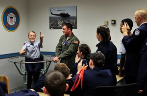 Emily Van Opdorpa North Stafford High School, Air Force Junior ROTC member, experiences the effects of the barany chair at the Aerospace and Operational Physiology Flight Training center, Dec. 14, 2012. The students were asked to perform various tasks while the chair was stopped and in-motion to demonstrate spatial disorientation. (U.S. Air Force photo/ Airman 1st Class Erin O’Shea) 