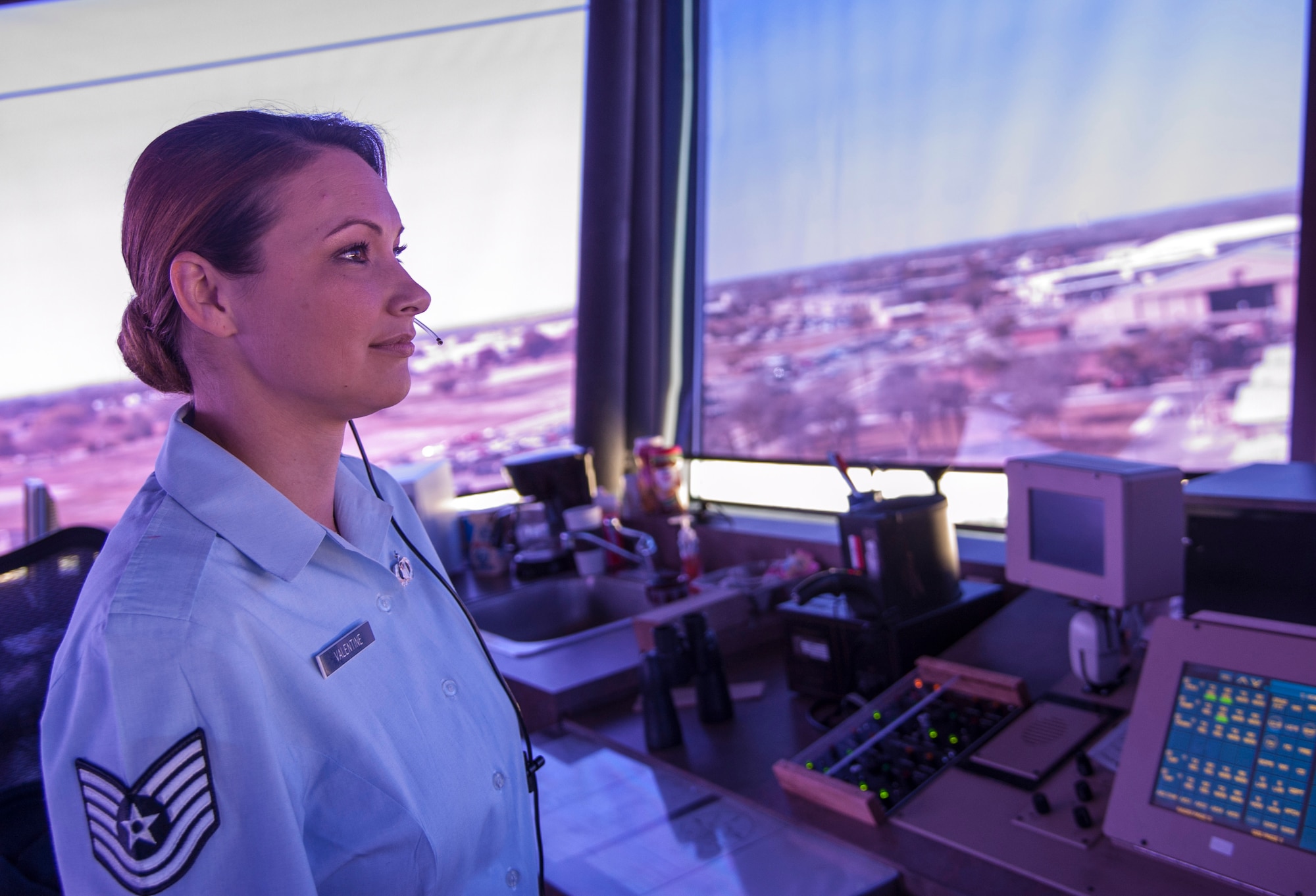 Tech. Sgt. Nicole Valentine, 47th Operations Support Squadron senior watch supervisor, monitors the flight lines from the air traffic control tower at Laughlin Air Force Base, Texas, Dec. 10, 2012. Valentine was selected to participate in two online social media interviews by the Air Force Recruiting Service to spotlight her career field and to discuss what it’s like being a female in a traditionally male dominated profession. (U.S. Air Force photo/Airman 1st Class Nathan Maysonet) 