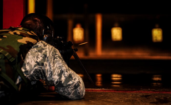 Staff Sgt. Michael Riffle, 628th Security Forces Squadron patrolman, fires an M-4 carbine in the prone position during a qualifying session at the Combat Arms Training and Maintenance firing range, Dec. 12, 2012, on Joint Base Charleston – Air Base, S.C.  Airmen from the 628th SFS participated in the M-4 training overseen by CATM instructors.  (U.S. Air Force photo/ Senior Airman Dennis Sloan)