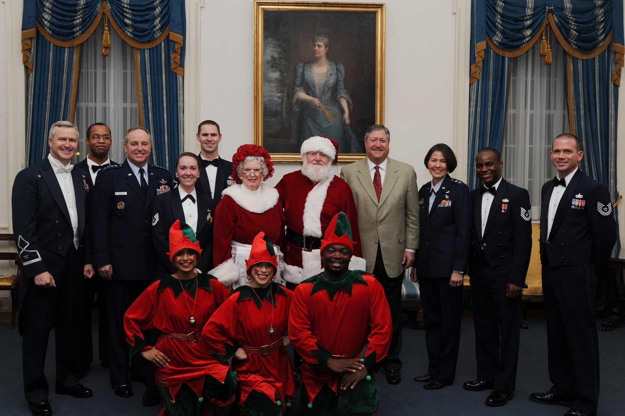 Secretary of the Air Force Michael Donley, Air Force Chief of Staff Gen. Mark A. Welsh III, and Air Force District of Washington commander Maj. Gen. Sharon Dunbar pose with U.S. Air Force Band commander Col. Larry Lang, U.S. Air Force Band members, Mr. and Mrs. Santa Claus and elves after the U.S. Air Force Band 2012 Holiday Concert at DAR Constitution Hall, Washington, D.C., Dec. 9. (U.S. Air Force photo/Airman 1st Class Aaron Stout)