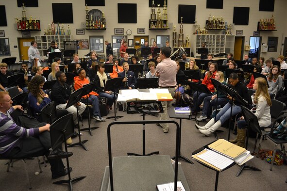 The Band of the U.S. Air Force Reserve sits in with the North Cobb High School Band to teach sight-reading during a music clinic Dec. 12, 2012.  The clinic provided students with different performance and delivery techniques, ways to listen while rehearsing a piece in a small group, and the requirements for being an Air Force musician. (U.S. Air Force photo/Chandra Brown)