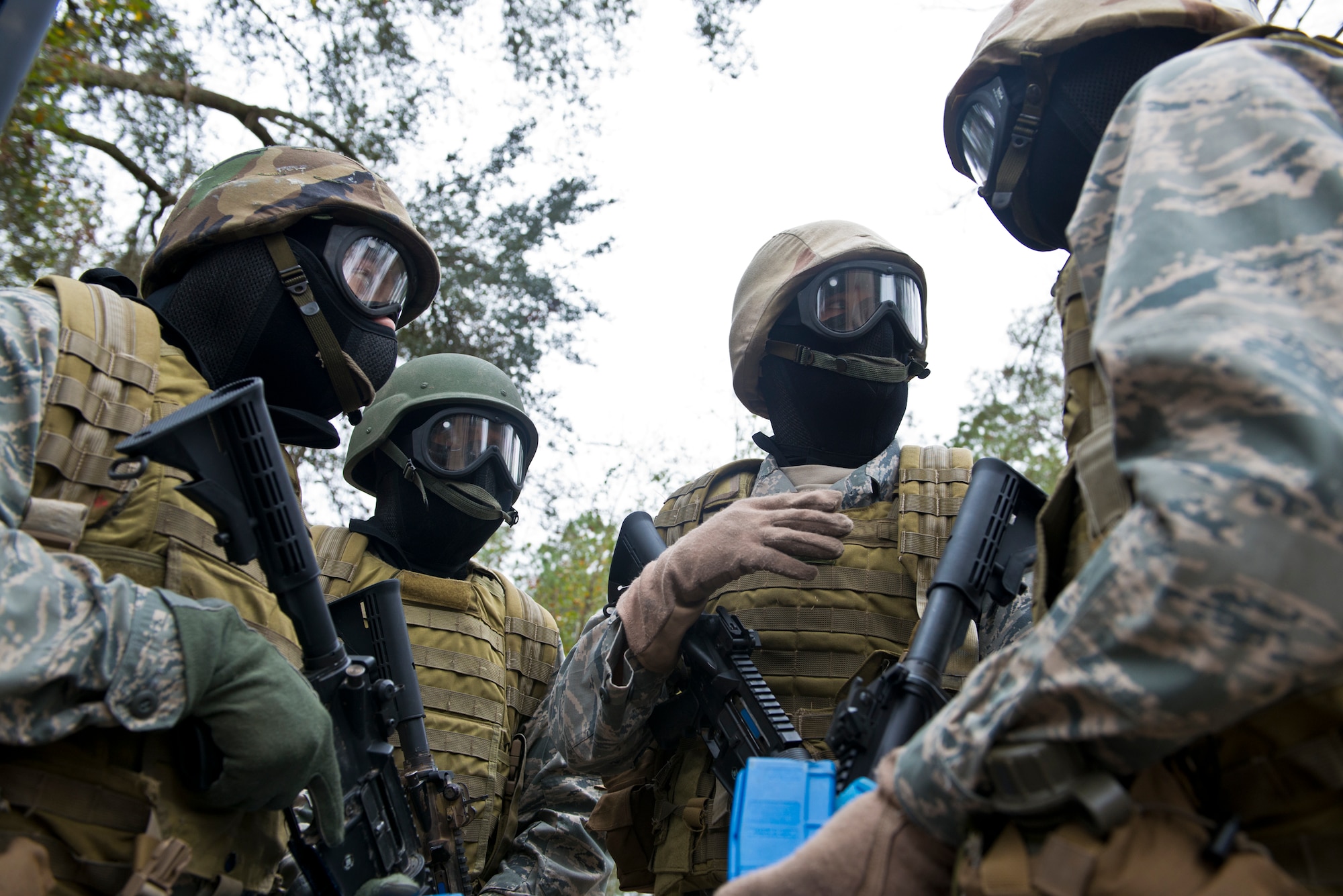 U.S. Air Force ROTC Cadets from multiple universities including Louisiana State University, University of Nevada, Las Vegas and the University of Oklahoma, discuss their plan of action during an Air Liaison Officer Aptitude Assessment course at Moody Air Force Base, Ga., Dec. 13, 2012. The course tested the cadets’ teamwork, leadership and ability to perform well under pressure. (U.S. Air Force photo by Senior Airman Douglas Ellis/Released)
