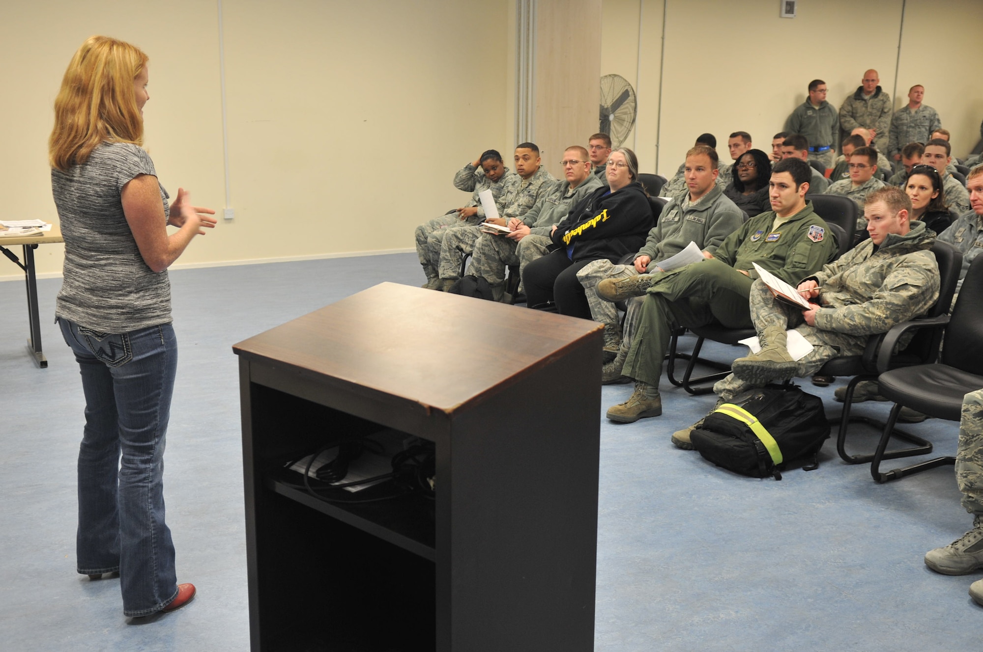 Kelli Hardin, 100th Air Refueling Wing sexual assault response coordinator assistant, from Santa Clara, Calif., administers a SARC briefing to Airmen Dec. 17, 2012, at RAF Mildenhall, England, as a part of a reintegration briefing. The Airmen attended a reintegration briefing to brush up on standards and policies on RAF Mildenhall. (U.S. Air Force photo by Airman 1st Class Dillon Johnston/Released)