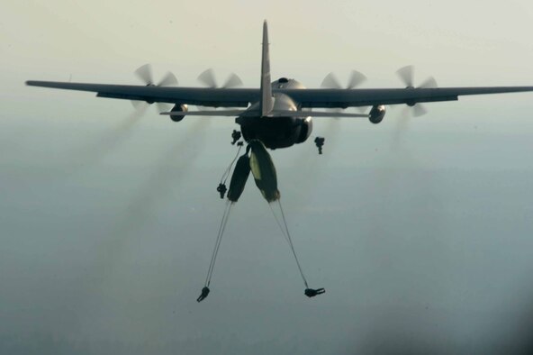 U.S. Army Soldiers jump from a U.S. Air Force C-130 Hercules aircraft during a multinational static line airdrop mission with Uruguay Army jumpmasters during Operation Toy Drop Dec. 8, 2012 over Sicily drop zone, Ft. Bragg N.C. 2012 marks the 15th year for the Randy Oler Memorial Operation Toy Drop which collects toy donations for children and families in need and gives paratroopers the opportunity to jump with foreign jumpmasters. Soldiers donate a new toy in exchange to jump with a foreign jumpmaster and earn foreign jump wings. This year, OTD has expanded from its traditional focus around Fort Bragg, N.C. to select cities around the country. OTD is a Fort Bragg airborne tradition. Operation Toy Drop combines thousands of toys, Army paratroopers, hundreds of volunteers, dozens of allied military personnel, and more than a dozen Air Force aircraft … all for what has become the world’s largest combined airborne operation. ( U.S. Air Force photo by Staff Sgt. Jason Robertson)