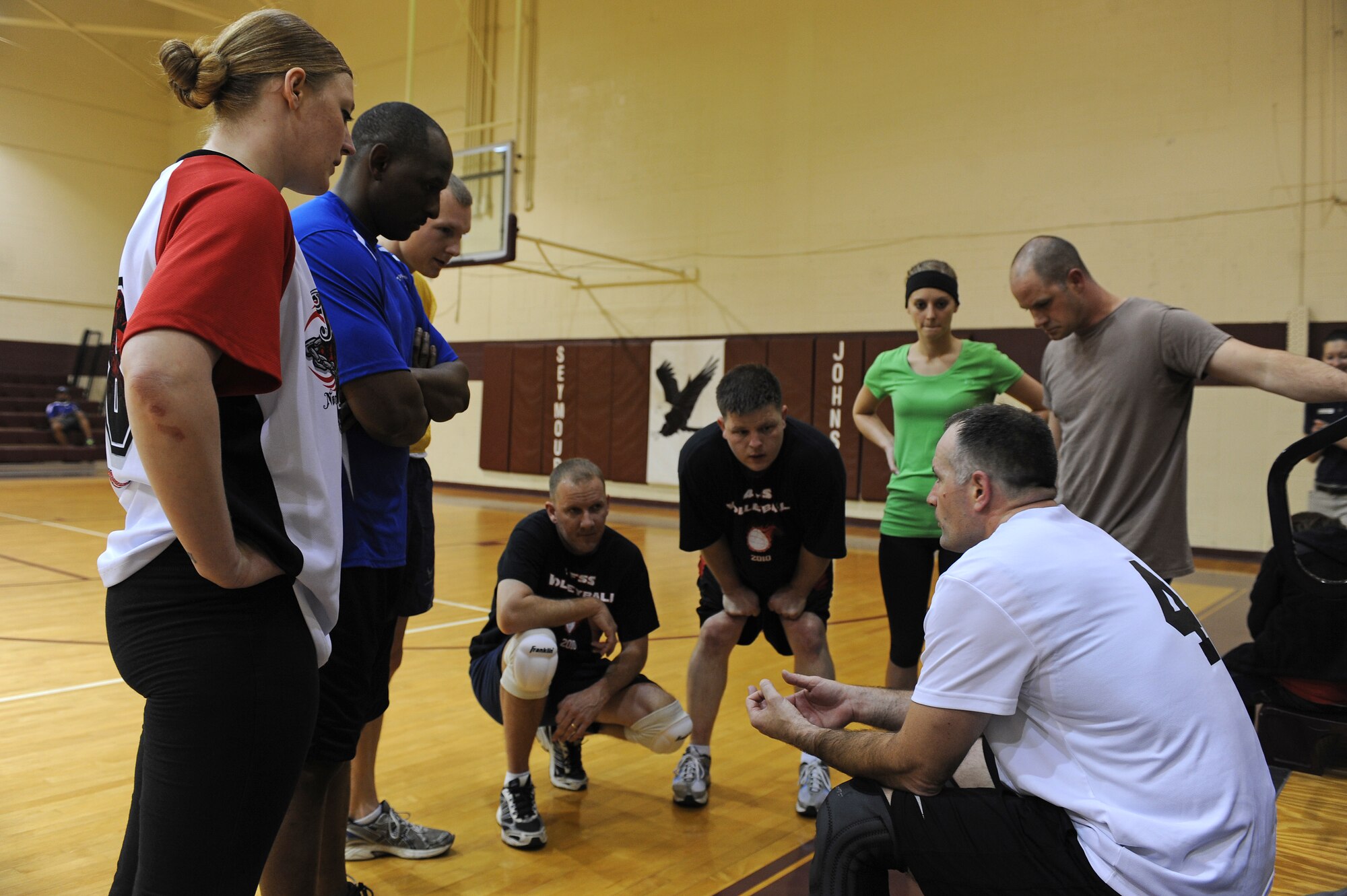 U.S. Air Force Lt. Col. Charles Parada, 4th Force Support Squadron commander, rallies his teammates during the intramural championship game at the fitness center on Seymour Johnson Air Force Base, N.C., Dec. 12, 2012. The 4th FSS was defeated by the 4th Component Maintenance Squadron, but received the Small Squadron Championship trophy at the end of the game. (U.S. Air Force photo/Airman 1st Class John Nieves Camacho/Released)