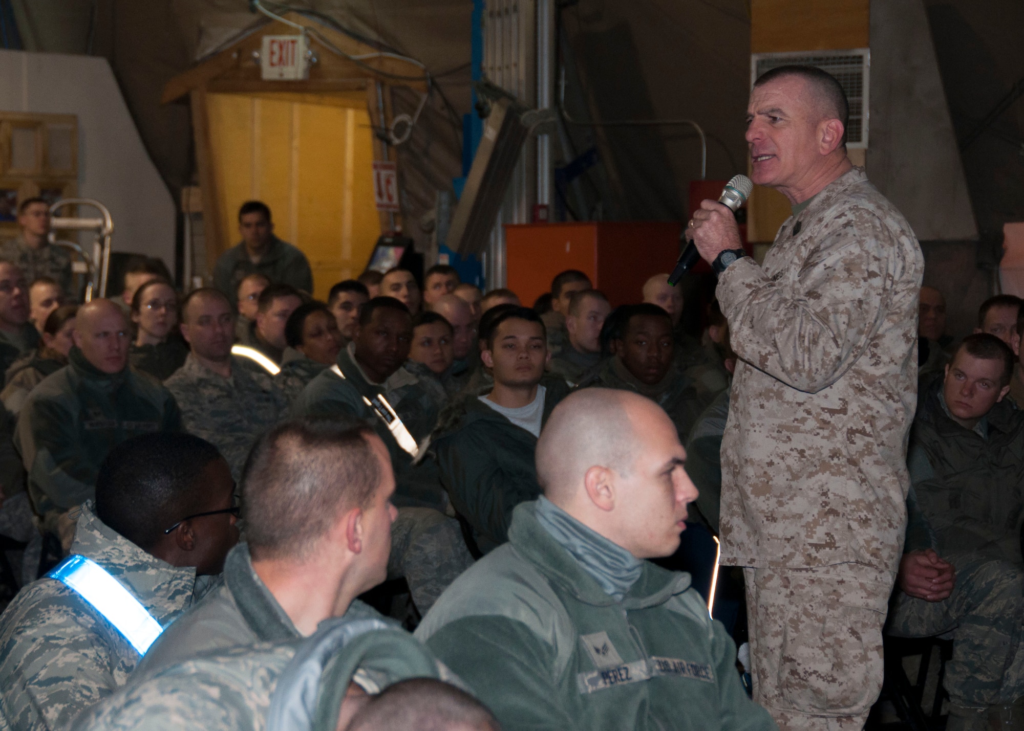 U.S. Marine Corps Sgt. Maj. Bryan B. Battaglia, senior enlisted advisor to the chairman of the Joint Chiefs of Staff, speaks with servicemembers during an enlisted call at the Transit Center at Manas, Kyrgyzstan, Dec. 15, 2012. During the enlisted call, Battaglia spoke on the chairman’s four priorities and took questions from the enlisted members. His visit was part of the chairman’s annual USO holiday tour. (U.S. Air Force photo/Tech. Sgt. Rachel Martinez)