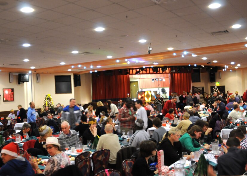 Participants attend the Air Force Sergeants Association Special Needs Christmas Party Dec. 15, 2012, at RAF Mildenhall, England. Both local and U.S. individuals attended the party, which included lunch, photos with Santa Claus, dancing and Christmas gifts. (U.S. Air Force photo by Tech. Sgt. Neal X. Joiner/Released) 