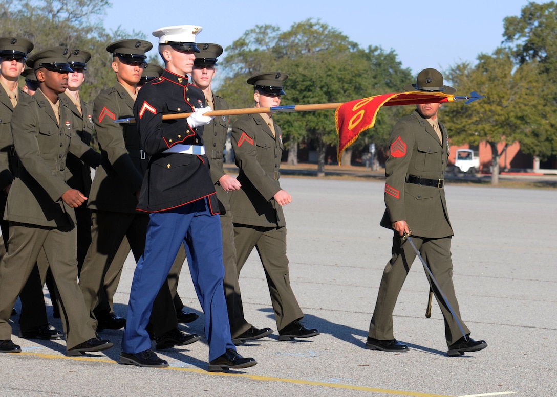 Pfc. Wesley McCulloch, honor graduate for platoon 3098, marches across the parade deck during the pass and review portion of graduation aboard Parris Island, S.C., Dec. 14, 2012. McCulloch was recruited out of his hometown, Dyersburg, Tenn., by Staff Sgt. John Totzke of Recruiting Sub Station Jackson, Recruiting Station Nashville. Upon graduation, McCulloch will enjoy some well-deserved leave at home followed by Marine Combat Training at Camp Geiger, N.C. (U.S. Marine Corps photo by Pfc. John-Paul Imbody) 