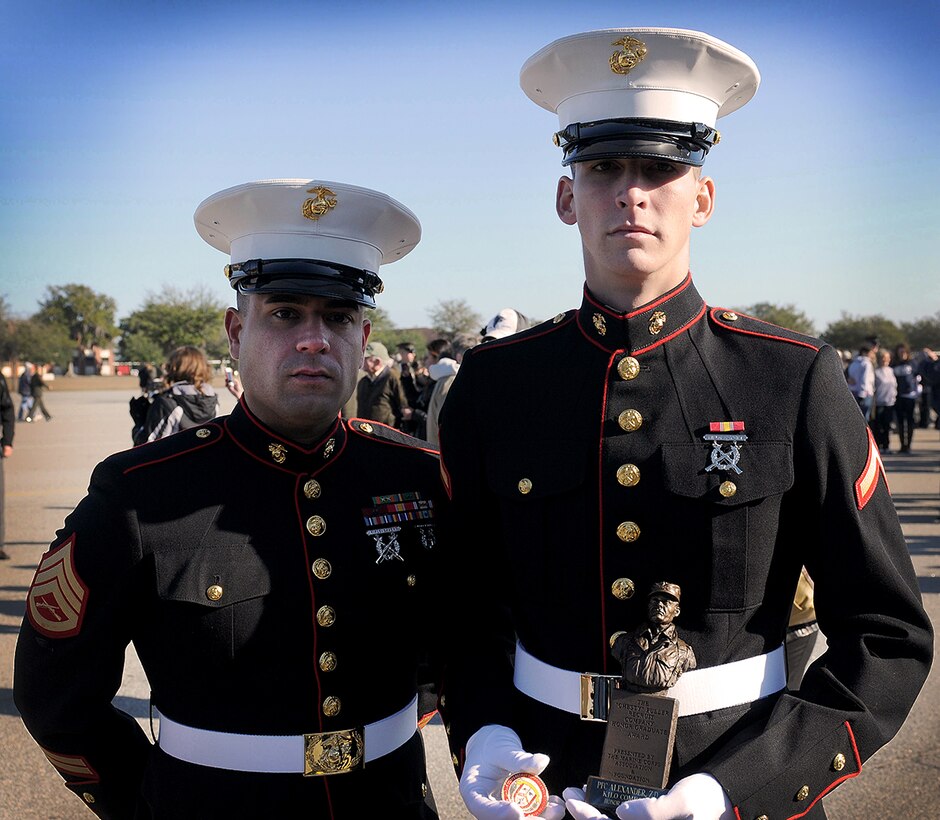 Pfc. Zachary Alexander, honor graduate for platoon 3100, stands with Staff
Sgt. Walter Frazao, Alexander's recruiter, after graduation aboard Parris
Island, S.C., Dec. 14, 2012. Alexander was recruited out of his hometown,
Stuart, Fla., by Staff Sgt. Walter Frazao of Recruiting Sub Station Stuart,
Recruiting Station Fort Lauderdale. Upon graduation, Alexander will enjoy
some well-deserved leave at home; followed by Marine Combat Training at Camp
Geiger, N.C.(U.S. Marine Corps photo by Pfc. John-Paul Imbody)
